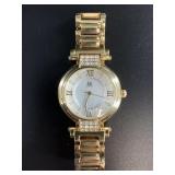 Fabulous gold-toned wristwatch with intricate face