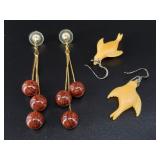 2 Pairs of earrings: 1 featuring seals