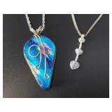 2 Pairs of silver-toned necklaces