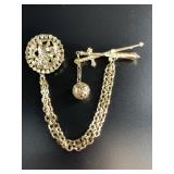 Gold-toned Victorian revival double brooch featuri