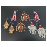Several pairs of hand beaded earrings