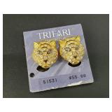 Pair of vintage Trifari earrings with original pac
