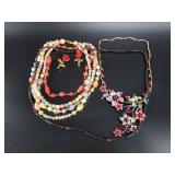 Several pieces of colorful fashion jewelry