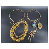 Several pieces of fashion jewelry, some wire wrapp