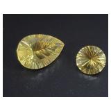 Two stunning, polished and faceted lemon quartz ge