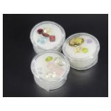 3 Cannisters of semi precious cut and polished sto