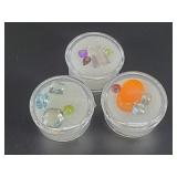 3 Cannisters of semi precious cut and polished sto