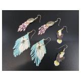Several pairs of hand beaded earrings