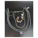 Several strands of multi-colored cultured pearls