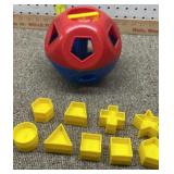 Tupperware Shape-O toy, a classic shape sorter