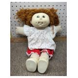 vintage Cabbage Patch Kids doll with strawberry