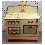 1950s Wolverine tin toy stove in a red and white