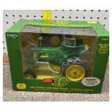 1/16 ERTL John Deere 530 tractor w/heat houser