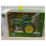 1/16 ERTL John Deere 730 with heat houser in box.