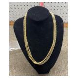 Gold colored necklace