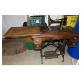 Tredle sewing machine in cabinet