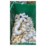 Tote of mixed PVC fittings