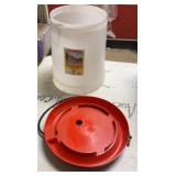 Heated water base and hanging chicken feeder