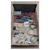 Costume jewelry and quill pens