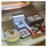 Tea pot, container of matches & cassette tapes