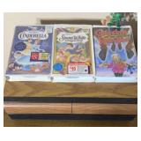 Lot of Disney vhs tapes and vhs storage cabiney
