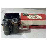 White mountain apple cover slicer and binoculars