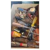 Flat of screwdrivers and pliers