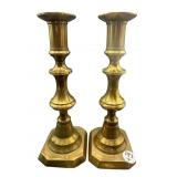 PR OF ANTIQUE BRASS PUSH UP CANDLESTICKS