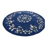 8 FT 2 IN ROUND MACHINE MADE RUG