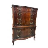 SWAN CARVED FLAMED MAHOGANY TALL CHEST