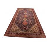 9 FT 9 IN X 5 FT 3 IN TAPESTRY RUG