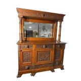 MONUMENTAL HEAVY CARVED OAK BUFFET WITH MIRROR