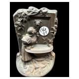 SMALL CAST IRON LADY AT FOUNTAIN DOOR STOPPER
