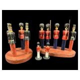 LOT OF WOODEN MINIATURE SOLDIERS ON STAND