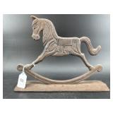 ANTIQUE CAST IRON ROCKING HORSE