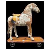 ANTIQUE TOY HORSE ON WHEELS