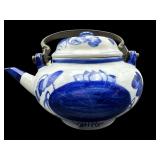 SMALL BLUE AND WHITE ORIENTAL TEAPOT WITH IRON