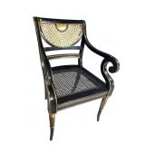 EBONIZED AND GOLD CANED ARM CHAIR