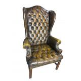 TUFTED LEATHER DISTRESSED WINGBACK CHAIR