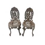 2 CAST IRON FIGURAL CHAIRS