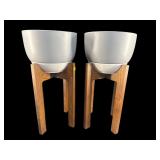 2 MODERN DESIGN CERAMIC PLANTERS ON WOODEN STANDS