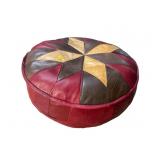 LEATHER STRAW FILLED ANTIQUE OTTOMAN