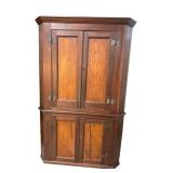 MIXED WOOD 19TH CENTURY PEGGED CORNER CUPBOARD