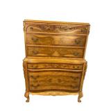INLAID WALNUT AND MAHOGANY CARVED CHEST ON CHEST
