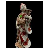 TALL ORIENTAL PORCELAIN FIGURAL CANDLEHOLDER