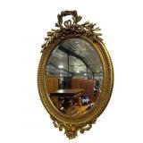 EARLY 20TH CENT. OVAL GOLD GILDED MIRROR