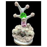 SMALL ANTIQUE PORCELAIN SPAGHETTI FIGURINE