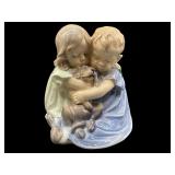 PORCELAIN GIRANDOLE 2 CHILDREN HUGGING