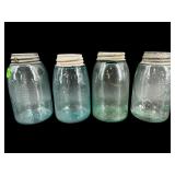 LOT OF 4 ANTIQUE MASON JARS WITH LIDS