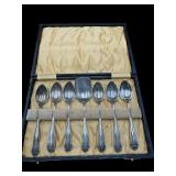 LOT OF 7 SILVER PLATE SPOONS IN CASE
